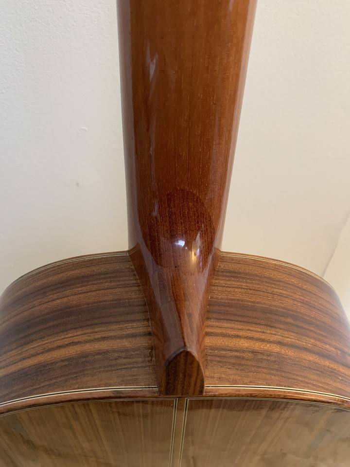 Top view a the Spanish heel of a 2018 Rios Nebro classical guitar