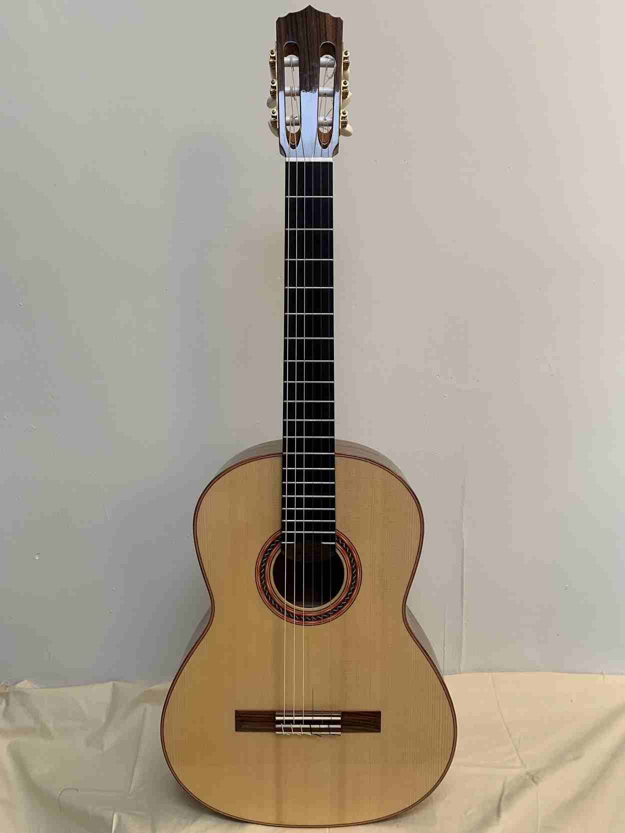 A concert classical guitar Hauser 1937 style build with Spruce and Ovankol back and sides